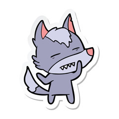 sticker of a cartoon wolf showing teeth