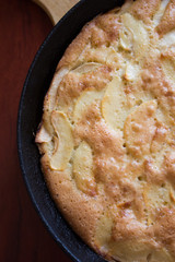 Charlotte pie pan. Apple pie. Homemade baking. Cook at home. Cast-iron pan.