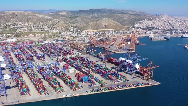 Aerial drone video of industrial container terminal in commercial port of Piraeus, Drapetsona, Attica, Greece