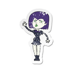 retro distressed sticker of a cartoon pretty vampire girl