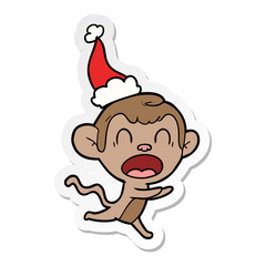shouting sticker cartoon of a monkey wearing santa hat