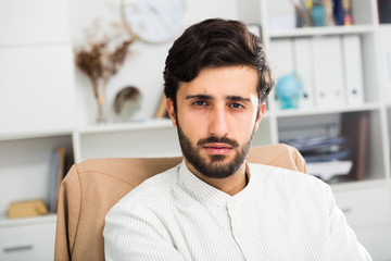 Portrait of handsome elegant office worker