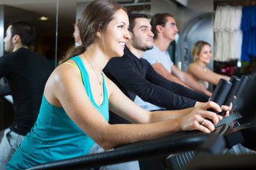 Fototapeta premium People training on treadmills