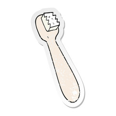 distressed sticker of a cartoon toothbrush