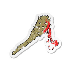 retro distressed sticker of a cartoon bloody stone age club