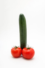 Cucumber and tomatoes in the form of penis.Vegetables in the form of penis