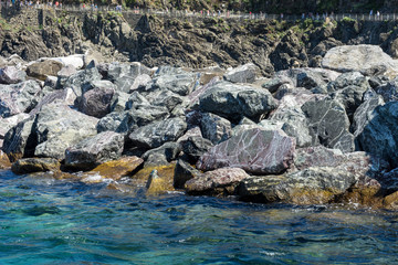 Italy,Cinque Terre,Riomaggiore, water next to the rock