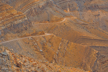 Mountain road from Khasab to Dibba on the background of a beautiful landscape. Musandam Peninsula. Oman