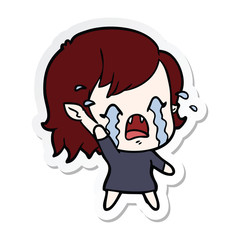 sticker of a cartoon crying vampire girl