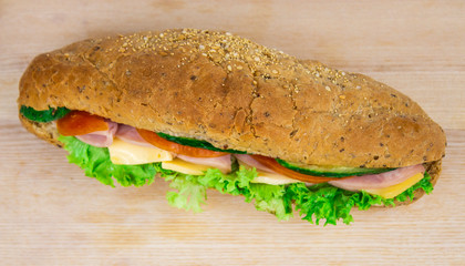 Fast food. Burger with vegetables, ham and cheese. Meat Hamburger Macro. Beef burger on a white background