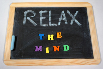 Fototapeta na wymiar Positive relaxation message on chalkboard