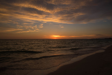 Orange flash in Florida at sunset on a Treasure Island Beach