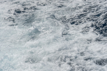 Italy,Cinque Terre,Riomaggiore,white frothing waves in the ocean
