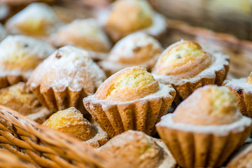 cupcakes in a basket in the bakery pastry shop