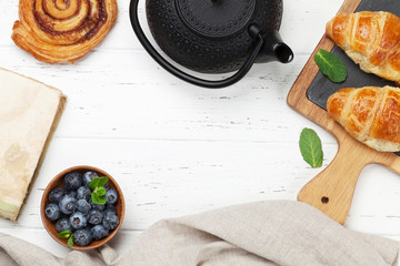 Tea and croissants breakfast