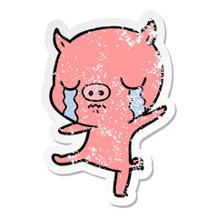 distressed sticker of a cartoon pig crying