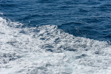 Italy,Cinque Terre,Riomaggiore,white frothing waves in the ocean