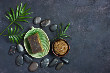 Organic spa cosmetic and products on stone background