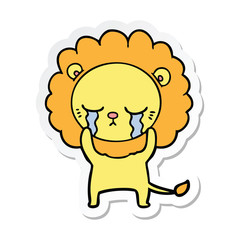 sticker of a crying cartoon lion
