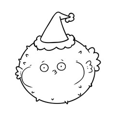line drawing of a puffer fish wearing santa hat