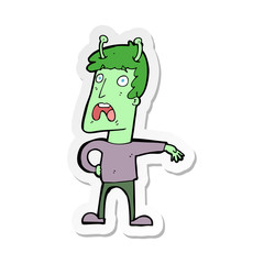 sticker of a cartoon unhappy alien