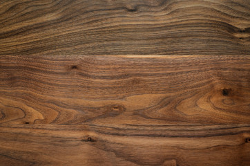 Dark brown old wood texture background with knots