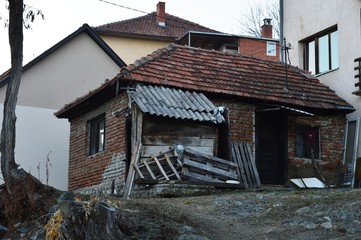 Fototapeta na wymiar An old little, ruined house