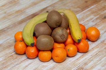Citrus and fruit on a wooden table