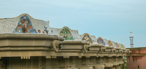 Parc Guell. Gaudí's mosaic work on the main terrace. Shoot in the evening in June 2016 Shoot in...