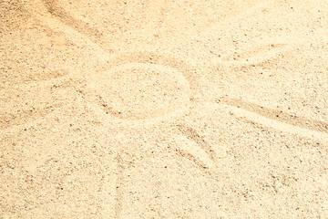 Beautiful drawing on the sand of the sea background