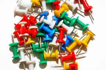  Colorful pushpins on white background