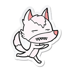 sticker of a cartoon wolf showing teeth