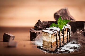 Tasty tiramisu cake  on background