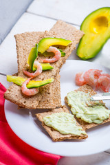 wholegrain bread with shrimp and avocado. Healthy snack