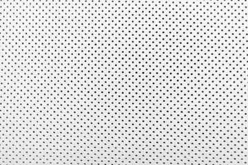 Modern luxury Car white leather interior.  Part of perforated leather car seat details. White...