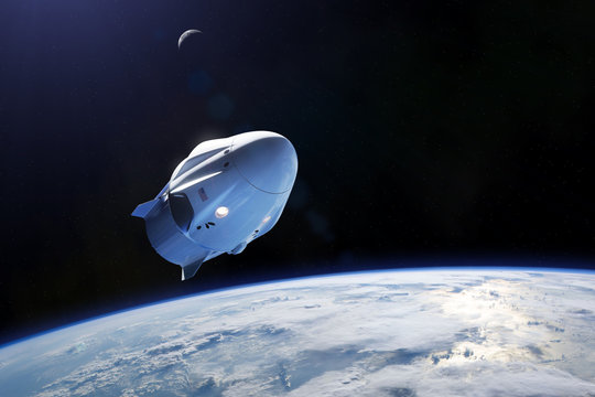 SpaceX Crew Dragon spacecraft in low-Earth orbit. Elements of this image furnished by NASA.