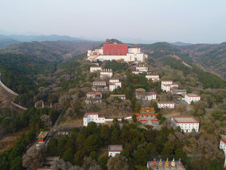 Fototapeta premium Aerial view of The Putuo Zongcheng Buddhist Temple, one of the Eight Outer Temples of Chengde, built between 1767 and 1771 and modeled after the Potala Palace of Tibet. Chengde Mountain Resort. China