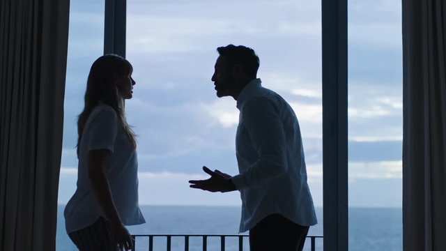 angry couple fighting in hotel room relationship trouble after marriage affair emotional wife confronting husband cheating problem
