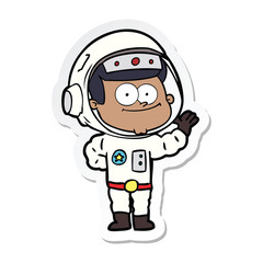 Fototapeta premium sticker of a happy astronaut cartoon
