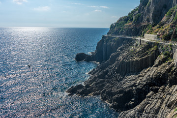 Italy,Cinque Terre,Riomaggiore, a rocky island in the middle of a body of water