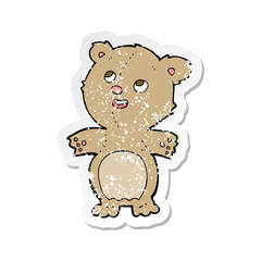retro distressed sticker of a cartoon happy little teddy bear