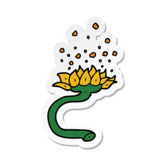 sticker of a cartoon flower releasing pollen
