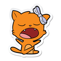sticker of a cartoon yawning cat