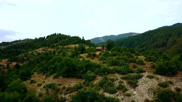Flight around small church on a hill