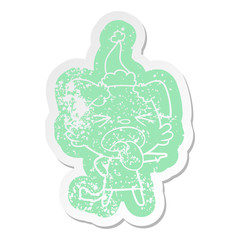 cartoon distressed sticker of a disgusted dog wearing santa hat