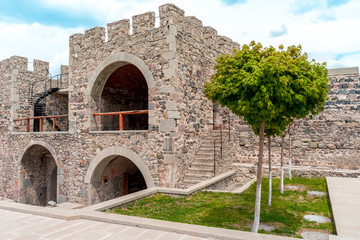 Obraz premium Stone Medieval Castle with Green Lawn, Rabati, Akhlatsikhe, Georgia, May.2017