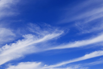 Naklejka na ściany i meble Beautiful blue sky with white clouds. Nature abstract background.