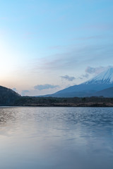 Fototapeta na wymiar Mount Fuji or Mt. Fuji, the World Heritage, view in Lake Shoji ( Shojiko ). Fuji Five Lake region, Minamitsuru District, Yamanashi prefecture, Japan. Landscape for travel destination.