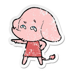Obraz premium distressed sticker of a cartoon elephant remembering