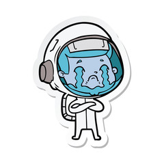 sticker of a cartoon crying astronaut